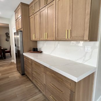 LBJ Flooring - White oak shaker cabinet with gold hardware from Hardware resources - Flooring Near Me - Corona, California LBJ Flooring - White oak shaker cabinet with gold hardware from Hardware resources - Flooring Near Me - Corona, California
