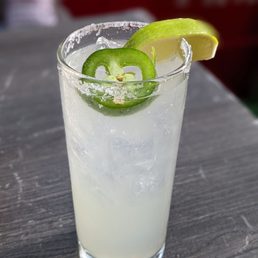 a margarita with a lime slice on the rim