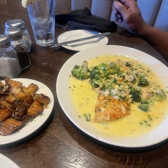 Nicolinni's Chophouse - Whitefish in clam sauce with Italian potatoes as selected side dish - Italian Near Me - Canfield, Ohio Nicolinni's Chophouse - Whitefish in clam sauce with Italian potatoes as selected side dish - Italian Near Me - Canfield, Ohio