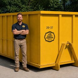 A Fresh Start - Now Snappy Dumpster Rental - Snappy Dumpster Rental owner Ian Olmsted standing next to a yellow 20 yard dumpster