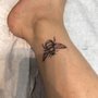 Photo of American Graffiti Tattoo & Piercing