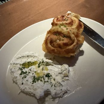 Del Mar Columbus - Caramelized onion bread and herb labneh - Mediterranean Near Me - Columbus, Ohio