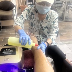 The Nail Company - $55 Pedicure no lotion used oil  my lines for my white tips are all side ways