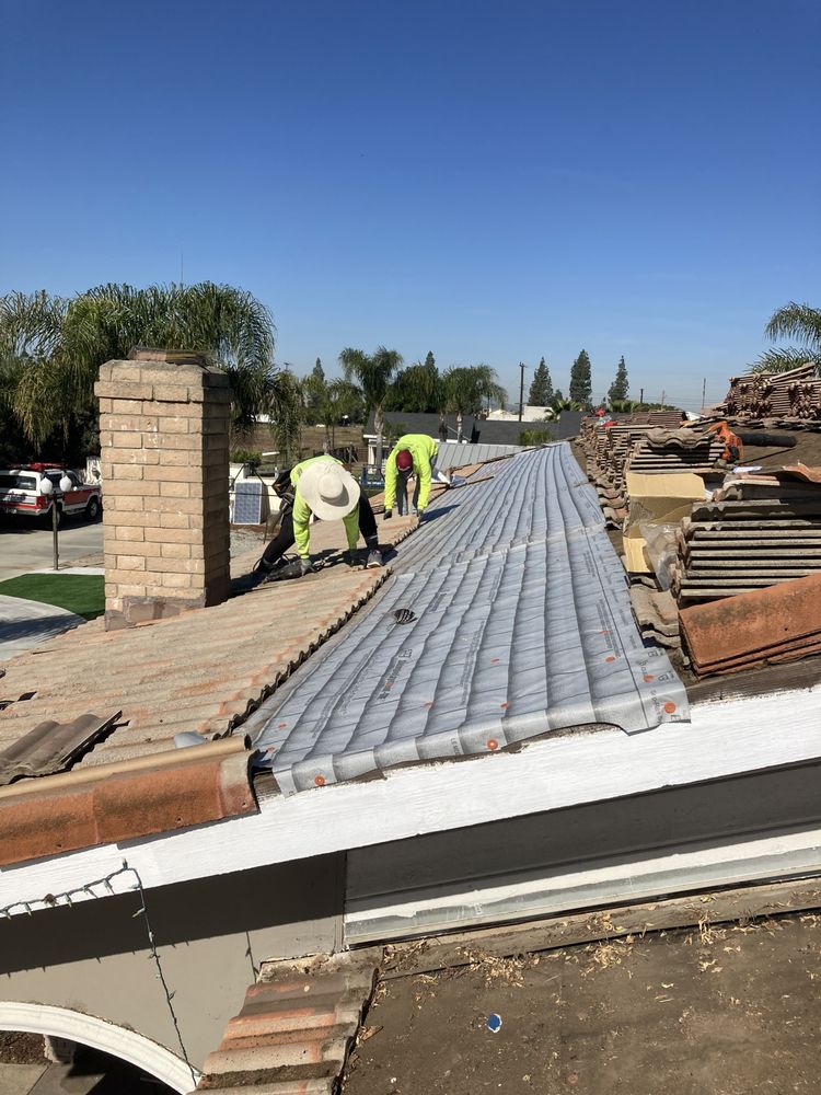 Slide of Alexander’s Roofing