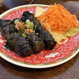 It's an appetizer it has grilled steak inside of the grape leaves.