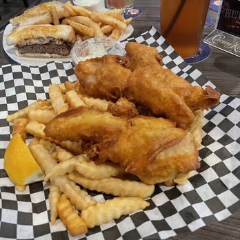 Griffins Grill - Fish & Chips on a bed of Crinkle Cut Fries. - Karaoke Near Me - Los Alamitos, California Griffins Grill - Fish & Chips on a bed of Crinkle Cut Fries. - Karaoke Near Me - Los Alamitos, California