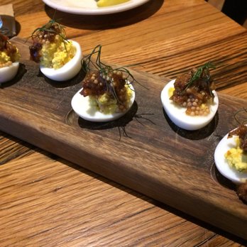 Whiskey Cake - Deviled eggs topped with bacon jam and pickled mustard seeds - New American Near Me - San Antonio, Texas Whiskey Cake - Deviled eggs topped with bacon jam and pickled mustard seeds - New American Near Me - San Antonio, Texas