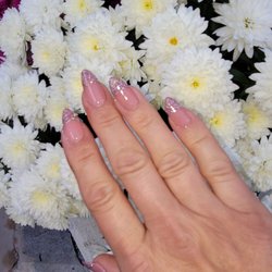 John Regal Nail - Love my nails! I've been going to John for years and I'm always happy. He is friendly, on time, clean and reasonably priced.