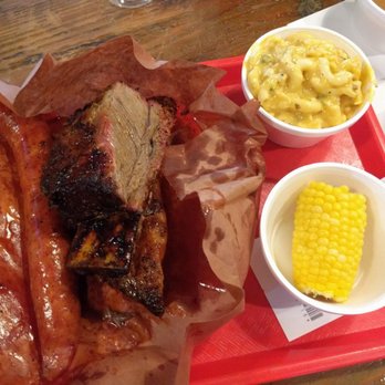 Cooper's Old Time Pit Bar-B-Que - Mild sausage, beef rib, brisket, jalapeno mac n cheese, and corn on the cobb. Prices are in my other pictures if you're curious. - Barbeque Near Me - Austin, Texas