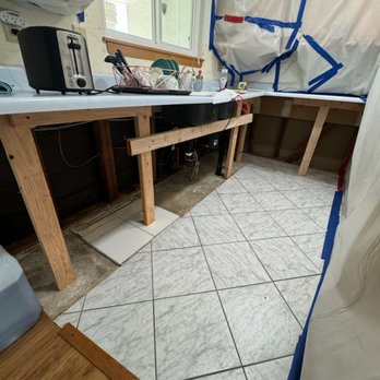 Flood Force - Kitchen still waiting to be put back together and after water mitigation has been done. - Damage Restoration Near Me