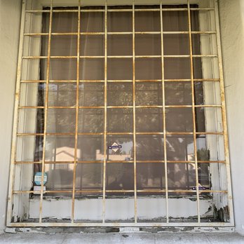 Stucco Contractor Pro - Remove security bar and sand/paint wood (before) - Drywall Installation & Repair Near Me - Pasadena, California