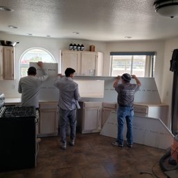 two men working in a kitchen