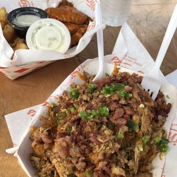BrewWings - The chicken on the tots is smoky and delicious - Chicken Wings Near Me