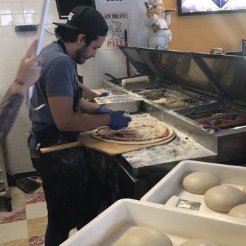 NYPD Pizza - Topping station - Pizza Near Me - Orlando, Florida