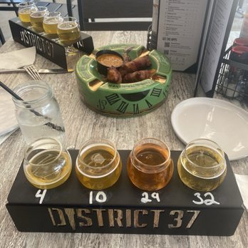 District 37 Kitchen & Taphouse - Flights and Cuban cigars - American Near Me - North Tonawanda, New York District 37 Kitchen & Taphouse - Flights and Cuban cigars - American Near Me - North Tonawanda, New York