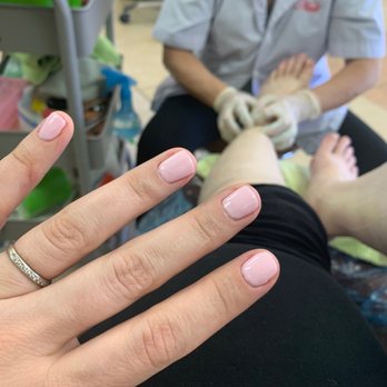 Higley Nails & Spa - Completed pink gel nails by Ivy, in the middle of a pedicure with Mina. - Nail Salons Near Me - Mesa, Arizona