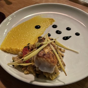Haven - Maple Sumac Glazed Halibut
blistered corn, tomato, coconut saffron puree, kaffir ink - Venues & Event Spaces Near Me - Tampa, Florida Haven - Maple Sumac Glazed Halibut
blistered corn, tomato, coconut saffron puree, kaffir ink - Venues & Event Spaces Near Me - Tampa, Florida
