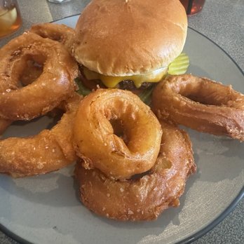 Patrick's Pub - Patrick's Burger with onion rings. - Irish Pub Near Me - Pittsfield, Massachusetts Patrick's Pub - Patrick's Burger with onion rings. - Irish Pub Near Me - Pittsfield, Massachusetts