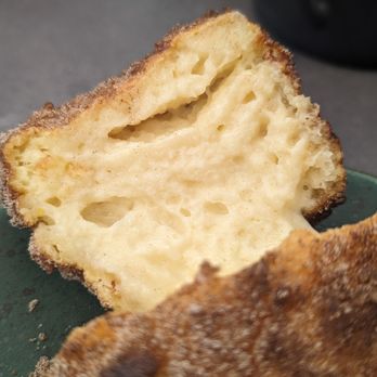Suspiro - Cross-section of the incredibly creamy Torrija. - Spanish Near Me - San Jose, California Suspiro - Cross-section of the incredibly creamy Torrija. - Spanish Near Me - San Jose, California