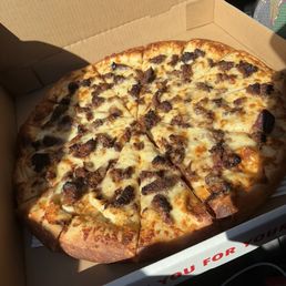 Custom made pizza with our own smoked meat Custom made pizza with our own smoked meat