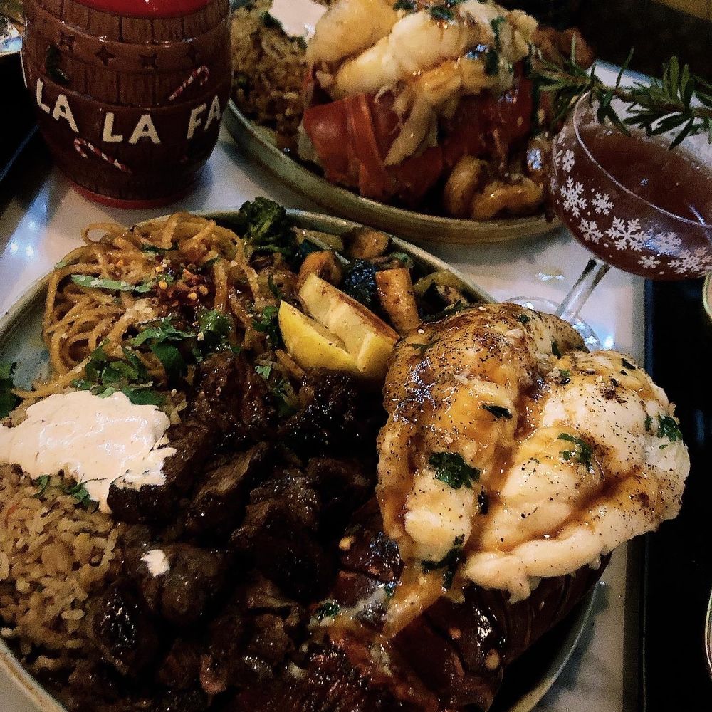 Rocks & Drams - Filet, lobster, garlic noodles, sautéed veggies and fried rice - Cocktail Bars Near Me - Ventura, California Rocks & Drams - Filet, lobster, garlic noodles, sautéed veggies and fried rice - Cocktail Bars Near Me - Ventura, California