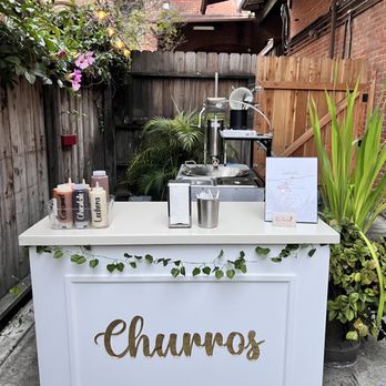 Sugar House - a churros stand with a sign that says churros - Desserts Near Me Sugar House - a churros stand with a sign that says churros - Desserts Near Me