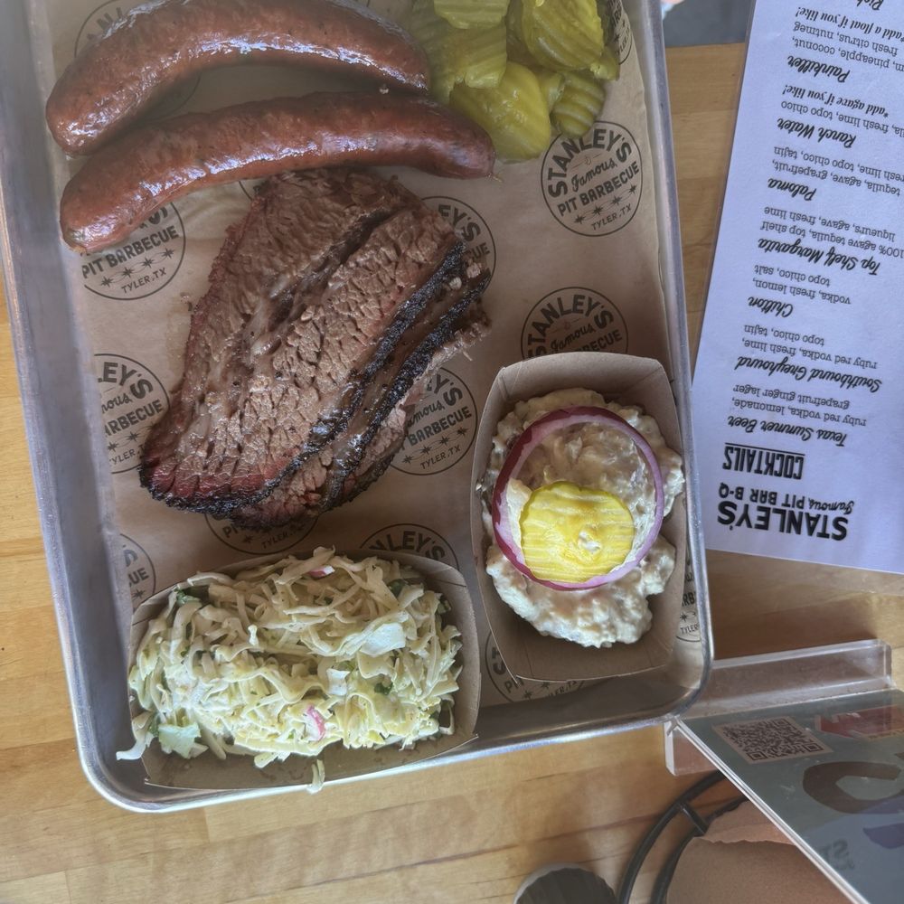 Stanley's Famous Pit Barbecue - 2 Jalapeño Cheddar Sausage links, 1/2 pound of brisket, side of potato salad, side of coleslaw. - Barbeque Near Me - Tyler, Texas Stanley's Famous Pit Barbecue - 2 Jalapeño Cheddar Sausage links, 1/2 pound of brisket, side of potato salad, side of coleslaw. - Barbeque Near Me - Tyler, Texas