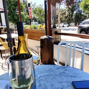 True Food Kitchen - Bottle of wine, while eating on the beautiful patio! - Vegetarian Near Me - Pasadena, California True Food Kitchen - Bottle of wine, while eating on the beautiful patio! - Vegetarian Near Me - Pasadena, California