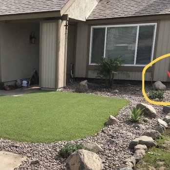 OmegaTurf - We actually moved the palm over to the right of the window. - Landscaping Near Me OmegaTurf - We actually moved the palm over to the right of the window. - Landscaping Near Me