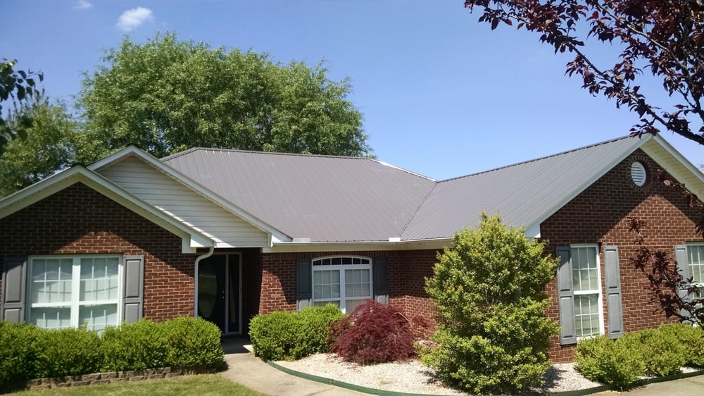 Slide of JC Metal Roofing