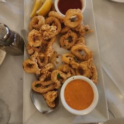 Gran Paradiso - Fried calamari, seafood and homemade pasta, apple strudel, and homemade bread pudding.