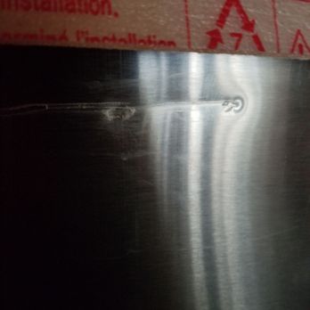 BrandsMart USA - The photo show the damage to my refrigerator - Electronics Near Me - Sunrise, Florida