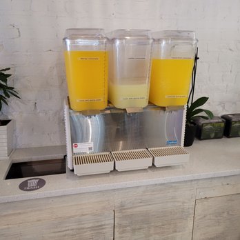 Bon Banh - three juice dispensers on a counter - Vietnamese Near Me - Hoboken, New Jersey