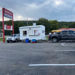 a taco mariachi truck parked in a parking lot