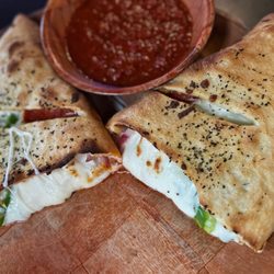 Toni & Joes Pizza - Calzone with pepperoni, green pepper, and red onion.