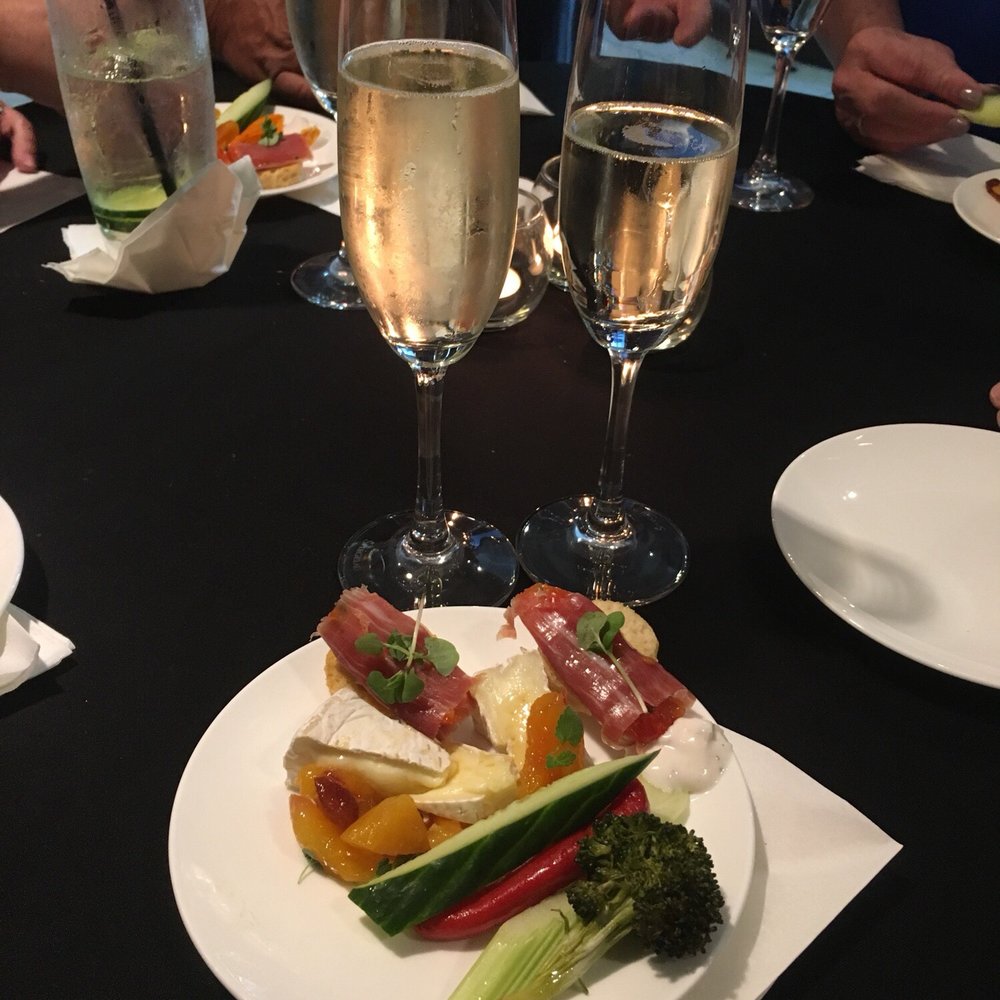 Dawson's - Appetizer plate with champagne - Steakhouses Near Me - Sacramento, California
