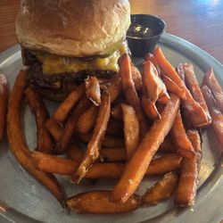 Keg burger with sweet potato fries. Two huge patties.