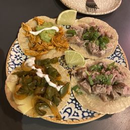 Nopal taco, carnitas taco, cochinita pibil taco.