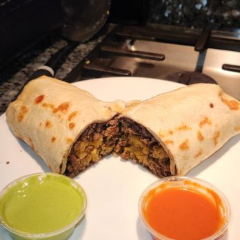 Wilson’s Cafe - Beef burrito so you can see how large and stuffed it is - Latin American Near Me - Oklahoma City, Oklahoma Wilson’s Cafe - Beef burrito so you can see how large and stuffed it is - Latin American Near Me - Oklahoma City, Oklahoma