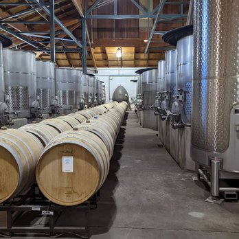 Gary Farrell Vineyards & Winery - a row of barrels - Wine Tours Near Me - Healdsburg, California Gary Farrell Vineyards & Winery - a row of barrels - Wine Tours Near Me - Healdsburg, California