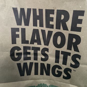 Wingstop - where flavor gets its wings - A paper bag featuring Wingstop's logo and the slogan "Where flavor gets its wings," emphasizing the restaurant's focus on flavorful chicken wings. - Chicken Wings Near Me - Bowie, Maryland