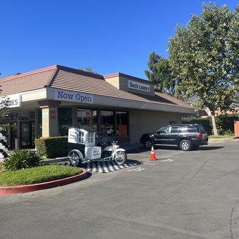 See's Candies - a car parked in front of a store - Candy Stores Near Me - Monrovia, California