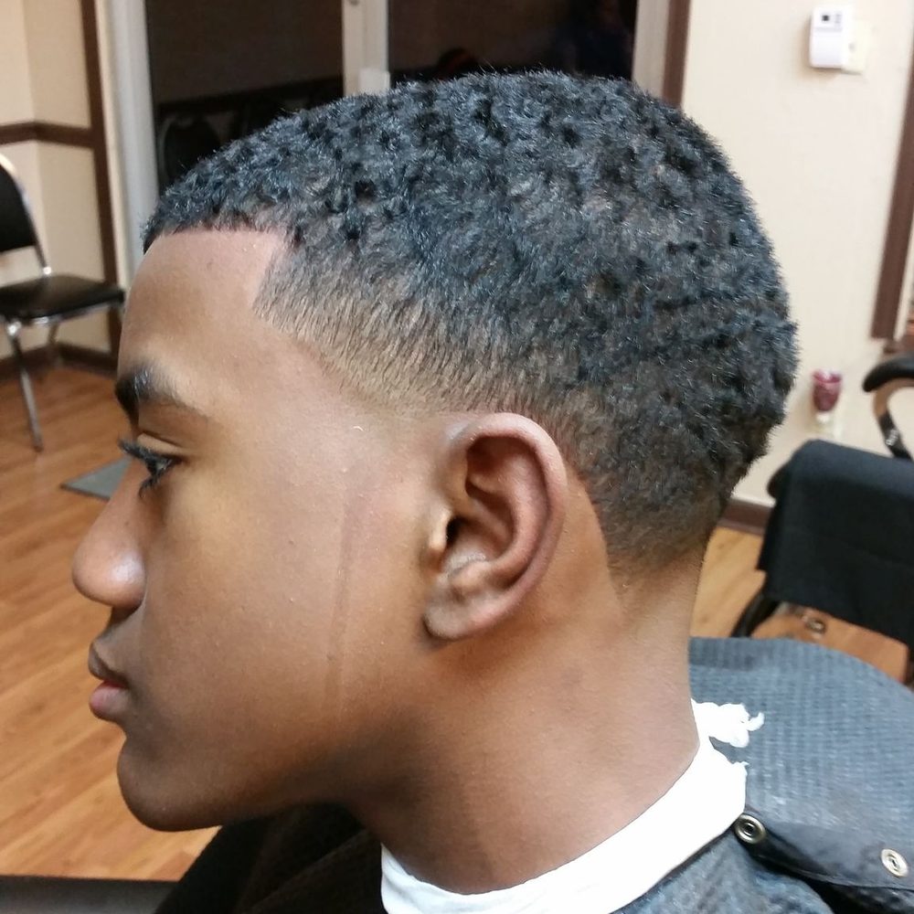 Enhancer's Barbershop Logo