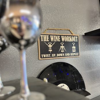 Reds Wine Boutique - a glass of wine and record - Wine Tasting Room Near Me - Sterling, Colorado