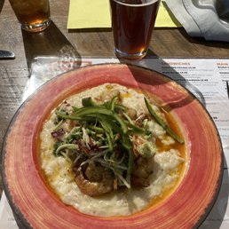 Shrimp over risotto and bed of jalapeño slaw. Shrimp over risotto and bed of jalapeño slaw.