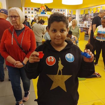 The Lego Store - Kareem built the two space ships and looked around while I was building a take home Lego set! - Toy Stores Near Me - Raleigh, North Carolina