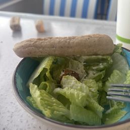 Salad with soggy croutons and a hot as rock bread stick. Salad with soggy croutons and a hot as rock bread stick.