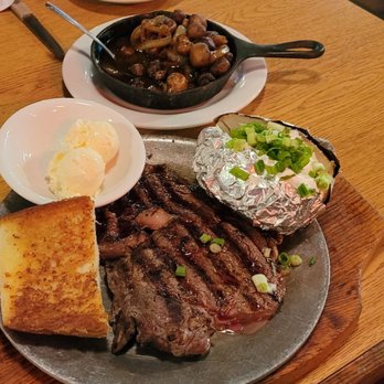 Steer'n Stein - Riley Steak Medium Rare, fat bake potato and yummy bread! - Steakhouses Near Me - Moreno Valley, California