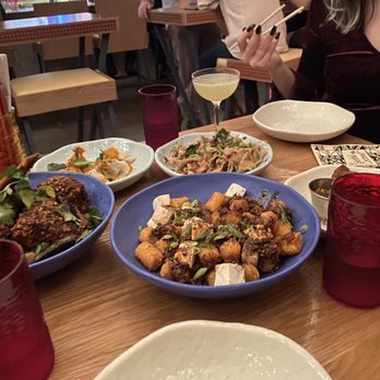 The Toasted Coconut - Grandmas hot chicken, mop tots, pulled noodles, tikka masala dumplings. - New American Near Me - Houston, Texas The Toasted Coconut - Grandmas hot chicken, mop tots, pulled noodles, tikka masala dumplings. - New American Near Me - Houston, Texas