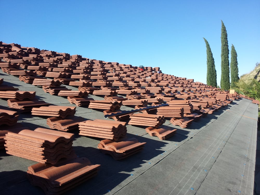 Slide of Tim Outzen Roofing